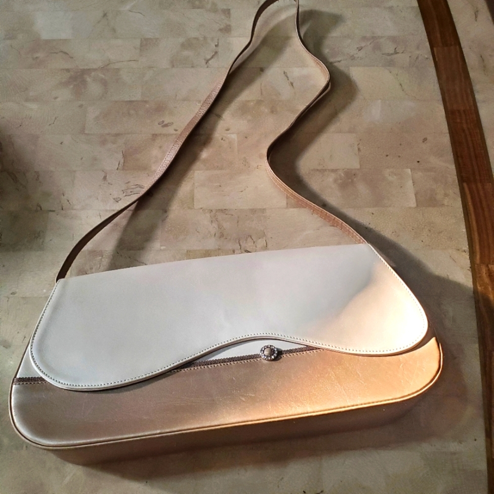 Stuart Weitzman two tone small purse can be used as a clutch or shoulder strap